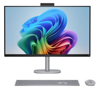 a close up of a computer monitor and keyboard on a white surface