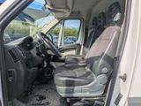 a picture of the inside of a van with the driver ' s seat up