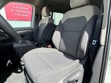 the interior of a car with the passenger seat up and the passenger seat down