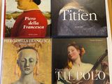 trois livres posés sur une table, avec la photo d'un homme portant un chapeau rouge