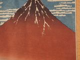 a picture of a painting of a mountain with a sky background