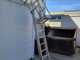a ladder that is leaning against a wall
