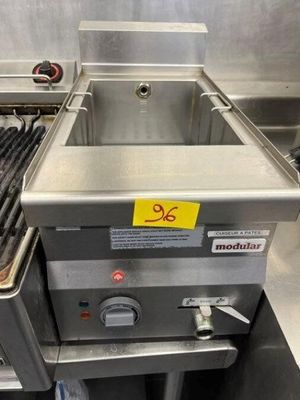 an image of a commercial fryer in a commercial kitchen