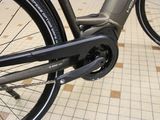 a close up view of a bicycle with a chain link