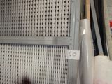 a box with a piece of paper on it next to a wall