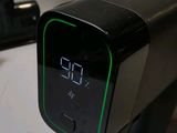 a digital clock on the handlebar of a bike