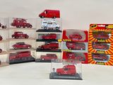 a lot of red toy cars in a display case