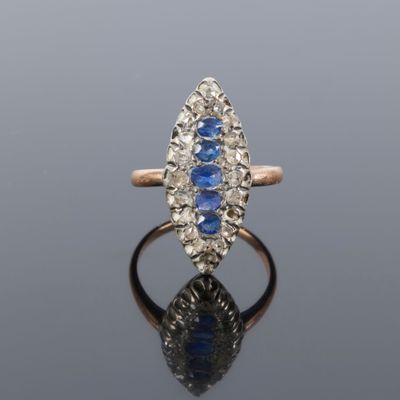an antique sapphire and diamond cluster ring