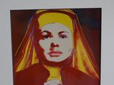 a picture of a woman with a nun ' s head on a wall