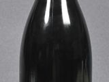a bottle of wine that is sitting on a table