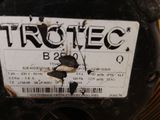a sign that says trotec on the back of a motorcycle
