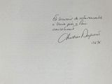 an old book with a handwritten title on it