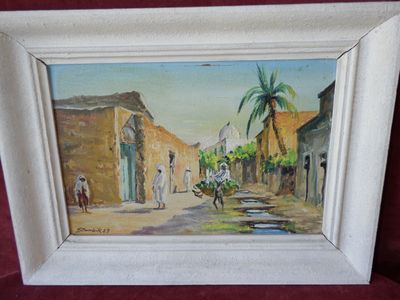 a picture of a painting of a street scene in a picture frame