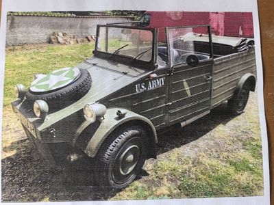 a picture of an old military vehicle on a table