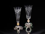 pair of cut glass goblets with dragon heads