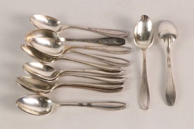 a lot of spoons and spoon spoons on the table