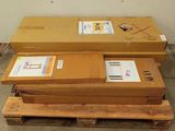 three boxes stacked on top of each other on a pallet