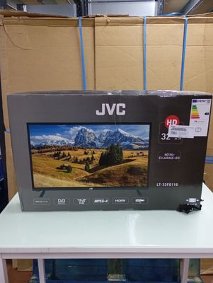 a tv sitting on top of a table in a store