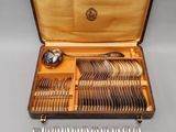 a case with silverware in it on a table