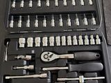 a black case with tools in it sitting on a table