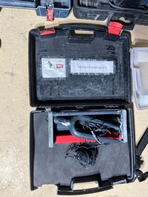 a black case with wires in it sitting on the floor