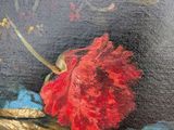 a painting of a red flower in a vase on a table