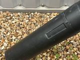 a black microphone that is laying on the ground