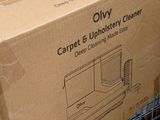 a box that is sitting on top of a shopping cart