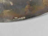 a knife that is sitting on top of a table