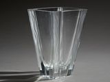 a glass vase that is sitting on a table