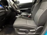 the interior of a car with a steering wheel and a dashboard