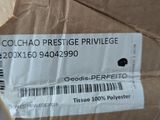 someone is holding a cardboard box with a price label on it