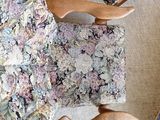 two chairs that are sitting on the floor in the living room
