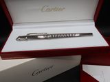 a silver pen in a red box on a black background