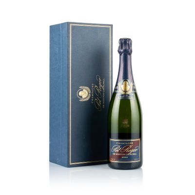 a bottle of champagne in front of a blue box