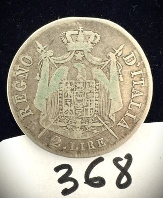 gros plan d'une pièce de monnaie surmontée d'une couronne