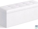 un banc blanc posé sur une surface blanche