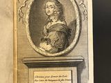 an open book with a drawing of a man in a mantle