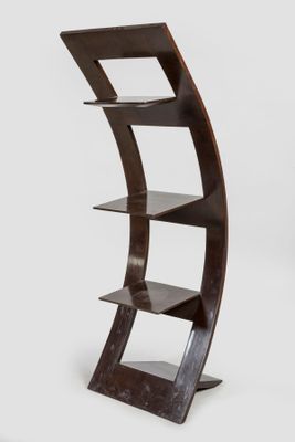 an image of a wooden shelf with three shelves on it