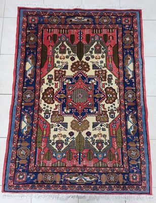 an oriental rug on a tile floor with a white background