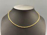 a gold chain necklace on a mannequin mannequin mannequin mannequin mannequin mannequin mannequin mannequin manne