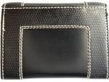black leather wallet with white stitching on the inside of it