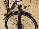 a bicycle that is sitting on the floor in the room