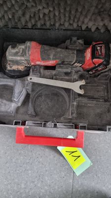 a box with tools in it on the floor