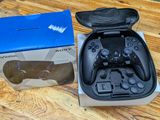 a box with a game controller inside of it on a table