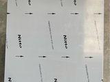 a box with a sheet of paper on top of it