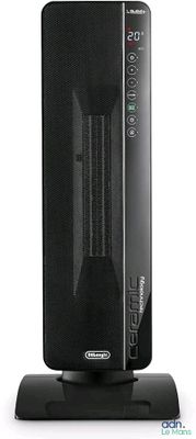une photo d'un radiateur portable noir posé sur un support