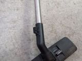 a close up of a vacuum cleaner on the floor in a room