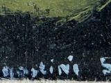 a painting of a tennis ball on the wall