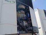 many air conditioners that are on the side of a building